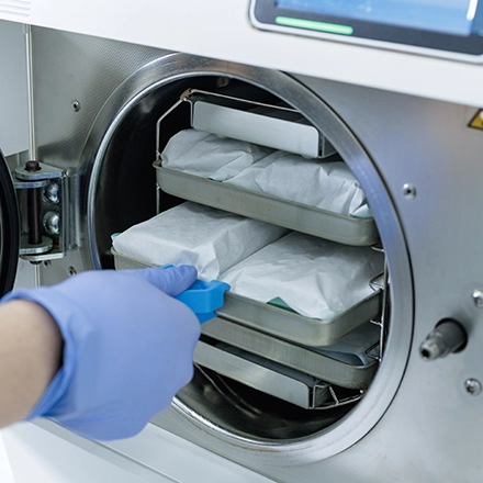 high pressure Autoclave being loaded with HPDE tyvek sterilizable pouches